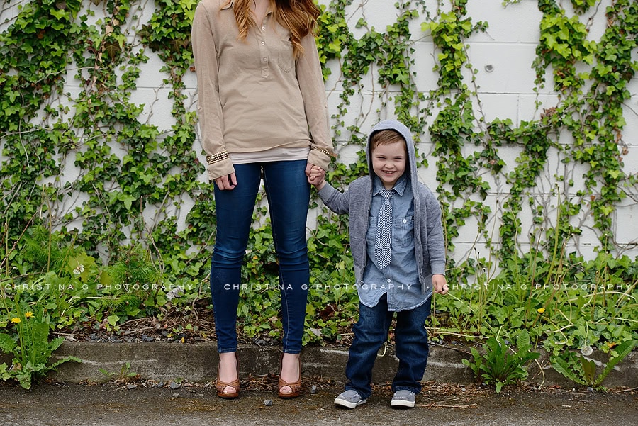 MOM & SON IN FRONT OF VINE WALL SMILING