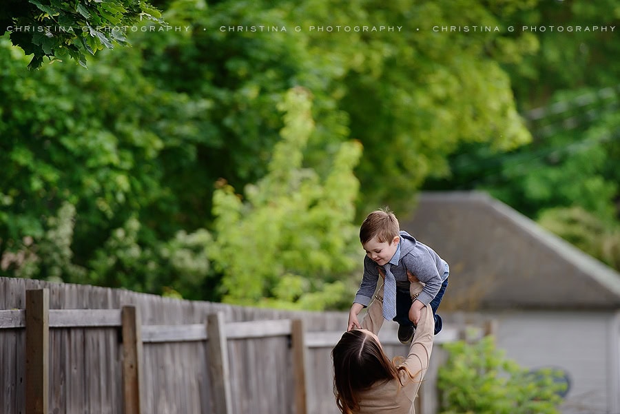 MOM AND SON PLAYING IN ALLEY WAY